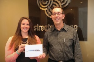 Walt Teichen poses with Rebecca Roerig of Streeter Place, our 2014 CAA iPad winner